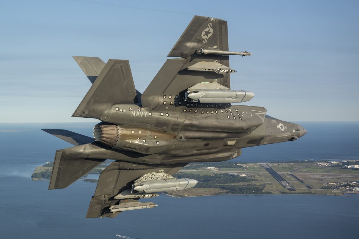 A US Navy F-35C fighter conducting a flight test with the LRASM missile