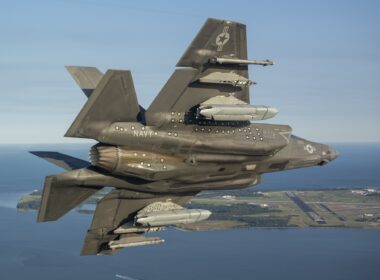 A US Navy F-35C fighter conducting a flight test with the LRASM missile