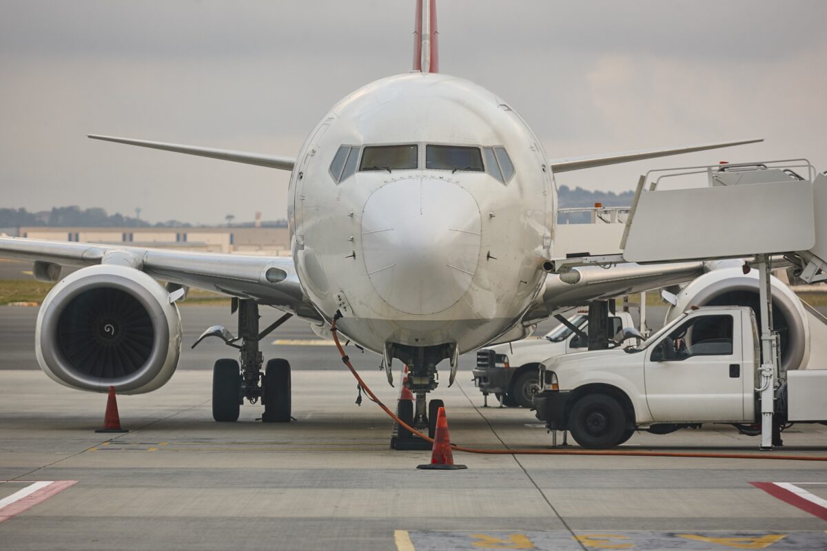 Airplane refueling on the runaway. Transportation industry. Fuel supply