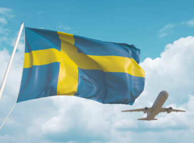 Airliner,Approaches,The,Swedish,Flag.,Tourism,In,Sweden.,3d,Rendering