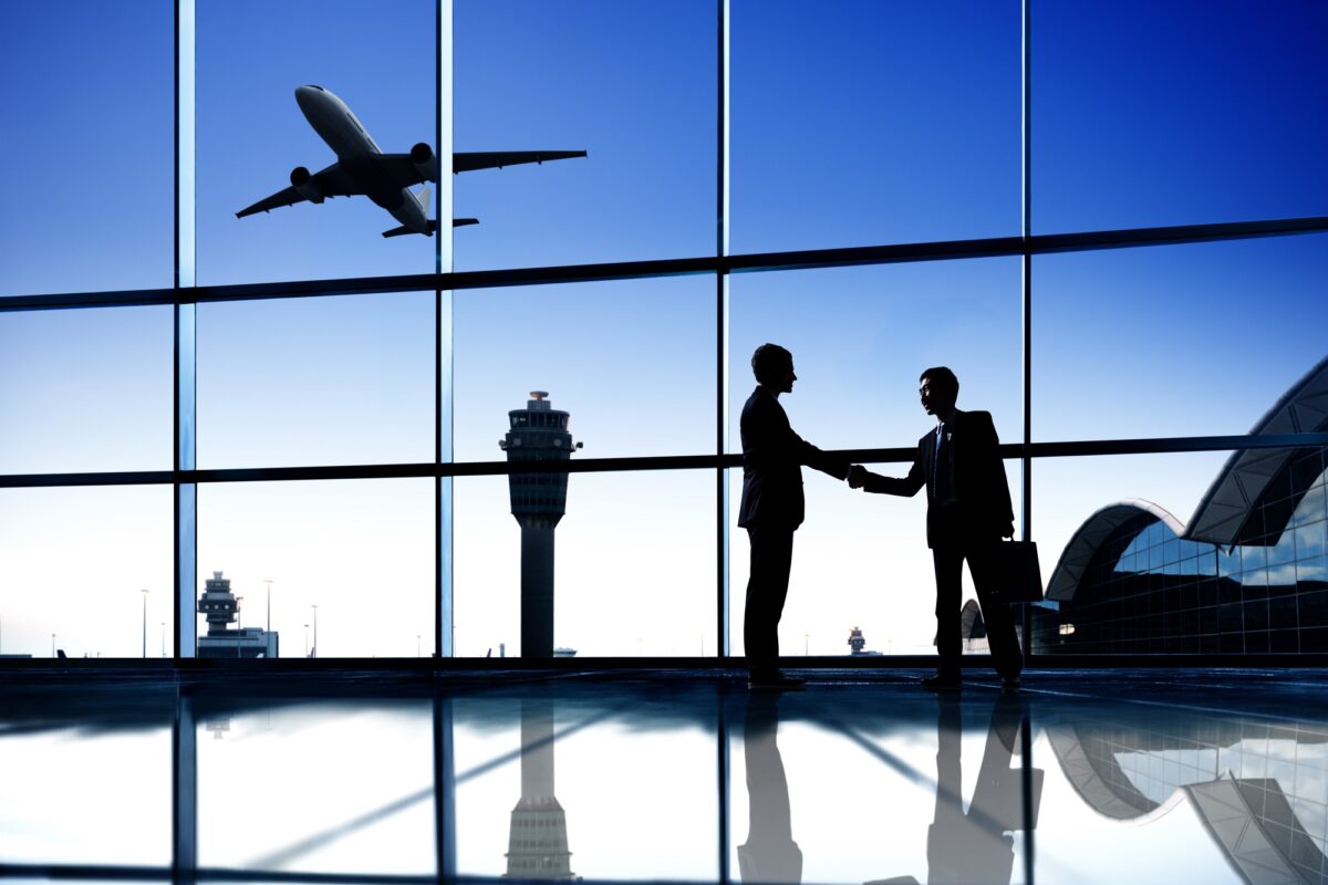 Business people meeting at an airport