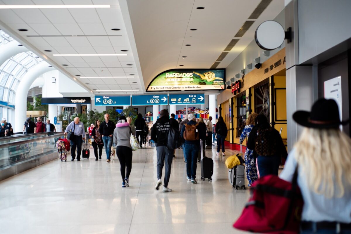 A group of passengers at Charlotte Douglas International Airport