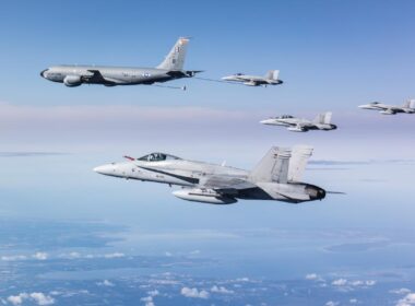 Four Finnish FA-18 Hornet multi-role fighters and a USAF KC-135 Stratotanker