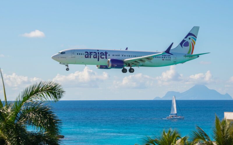 Arajet Boeing 737 Max 8 flying over Maho Beach