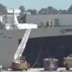 A Cessna 172 landed on a roof of a hangar when practicing touch and goes