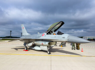 A Danish F-16 fighter jet parked on an air base