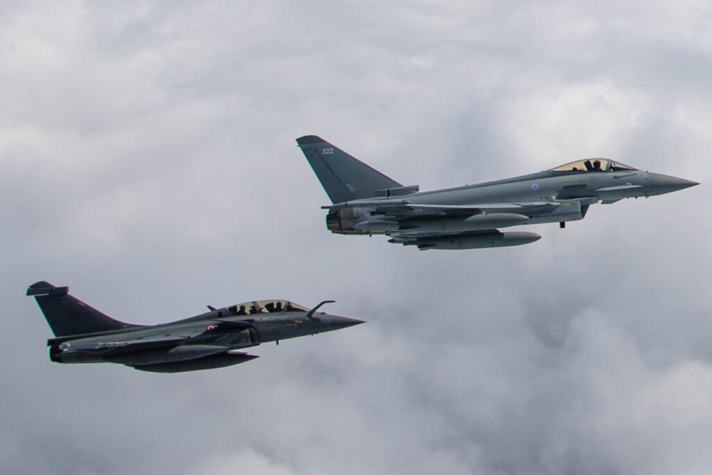 A Eurofighter Typhoon and a Dassault Rafale flying in formation