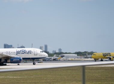 A-JetBlue-and-Spirit-aircraft-facing-each-other-on-the-runway