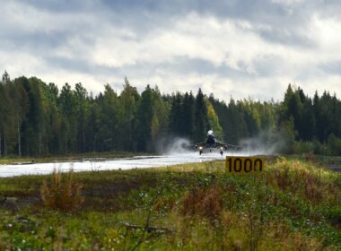 A Royal Air Force Eurofighter Typhoon taking off from a Finnish road