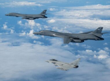 A Royal Air Force Typhoon fighter jet flying with two U.S. Air Force B-1B bombers