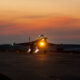 A Russian Su-34 aircraft taking off by night