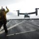 A V-22 Osprey tiltrotor aircraft aboard the USS Ashland