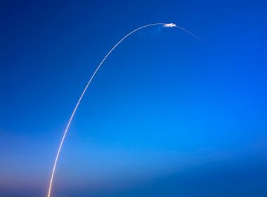 A rocket launch over water