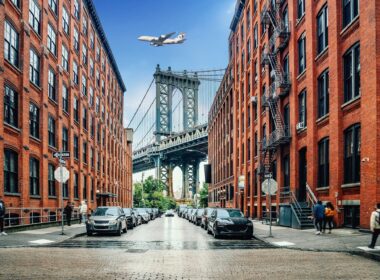 Dumbo district view in Brooklyn with Manhattan Bridge and New York City in the background