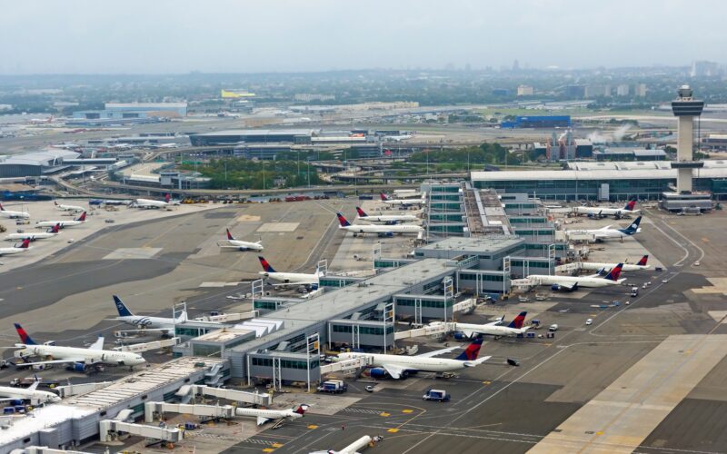 Aerial view of JFK airport terminal tower and apron