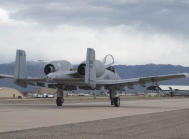 An A-10C Thunderbolt II aircraft taxis towards the 309th Aircraft Maintenance and Regeneration Group at Davis-Monthan Air Force Base