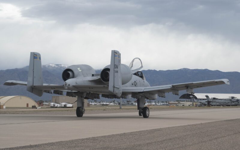 An A-10C Thunderbolt II aircraft taxis towards the 309th Aircraft Maintenance and Regeneration Group at Davis-Monthan Air Force Base