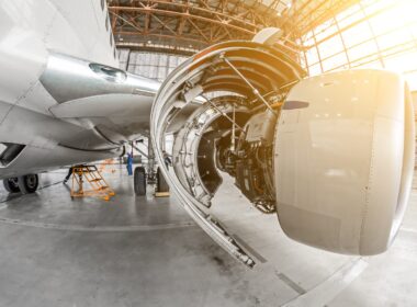 An aircraft undergoing maintenance in a hangar