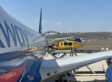 Bell helicopter being lifted into a Boeing 747