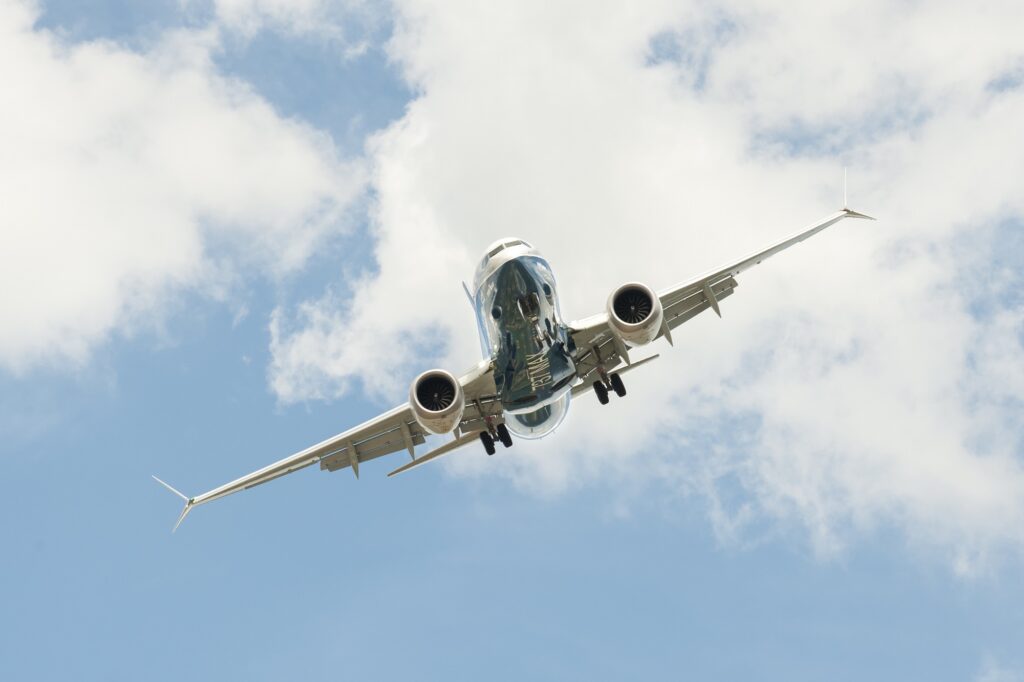 Boeing 737 MAX on a steep angled landing descent to Farnborough UK