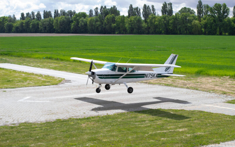 Cessna 172 is landing Small airplane in the sky student is learning how to land on the ground