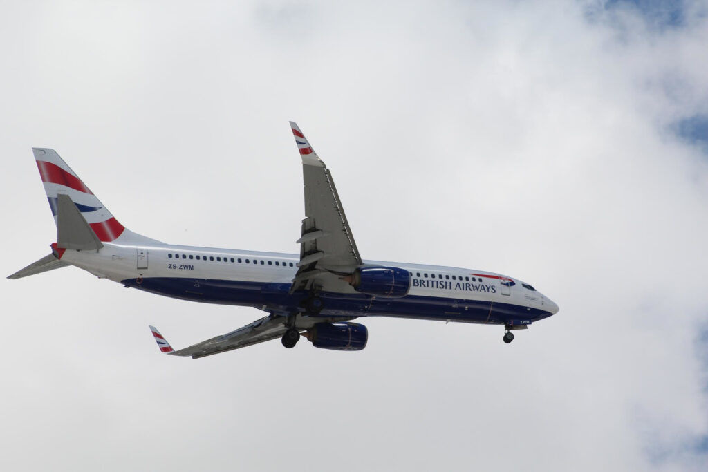 Comair 737 8 landing at OR Tambo international runway 03L