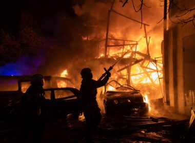 Emergency personnel work at the site of a drone strike in Ukraine