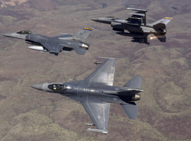 F-16 advanced fighter jet flying in formation with other F-16s and fighter jets