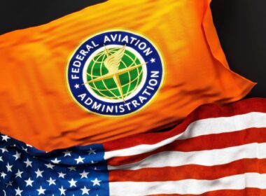 Flag of the FAA along with a flag of the US