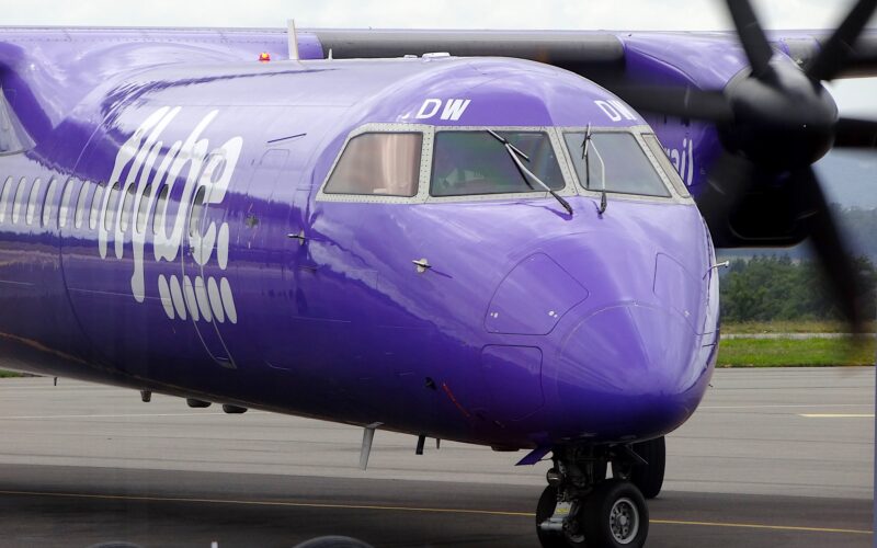 Flybe plane on the runway with pilot in the window