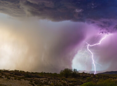 Lightning illuminates a microburst from a monsoon thunderstorm in the Arizona desert