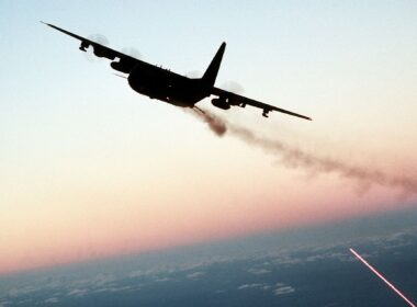 Lockheed AC-130 gunship firing