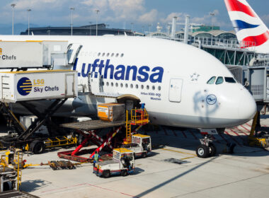 A Lufthansa A380 aircraft is being catered and cleaned as passengers disembark while cargo is unloaded after arriving at Hong Kong International Airport