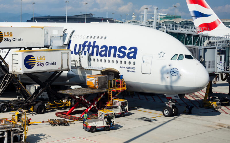 A Lufthansa A380 aircraft is being catered and cleaned as passengers disembark while cargo is unloaded after arriving at Hong Kong International Airport