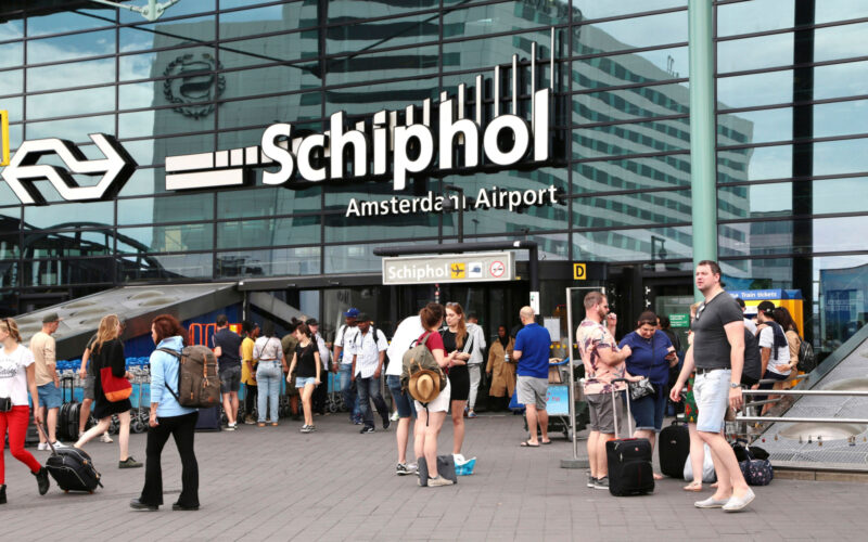 Passengers at Amsterdam Schiphol airport