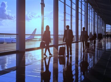 Passengers walking in an airport terminal