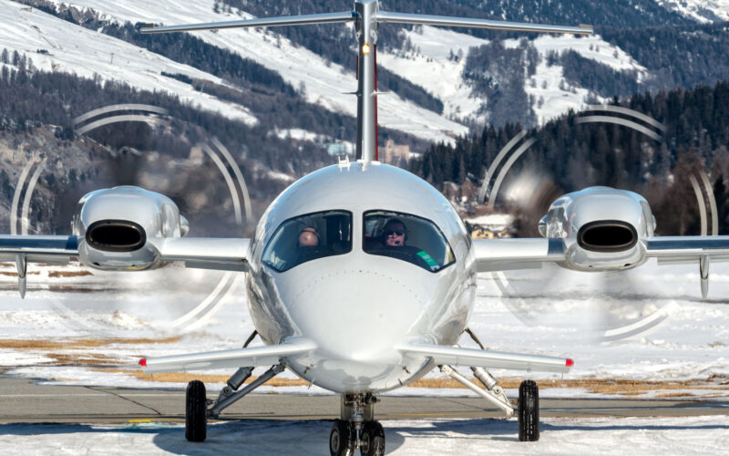 Piaggio P180 over snowed taxiway