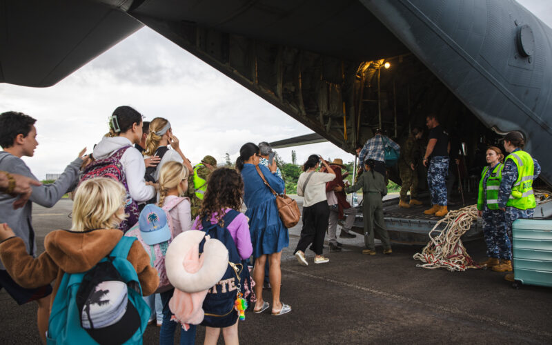 Royal Australian Air Force C-130 evacuating citizen from New Caledonia