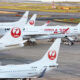 Several Japan Airlines aircraft parked