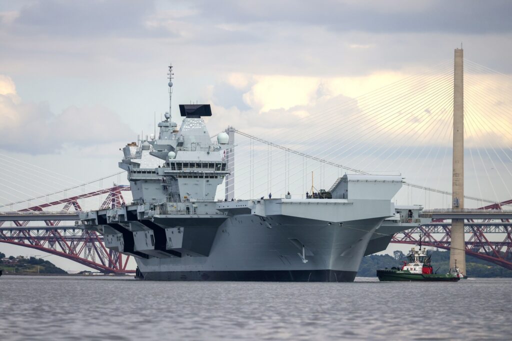 The HMS Prince of Wales aircraft carrier leaves Rosyth dry dock