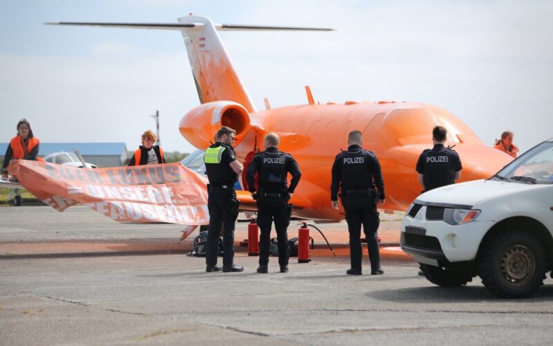 The Last Generation activists spray painted a private jet orange at an airport in Germany