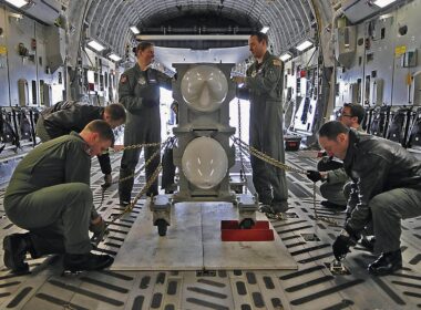 Two B61 gravity nuclear bombs being loaded into a C-17 transport aircraft