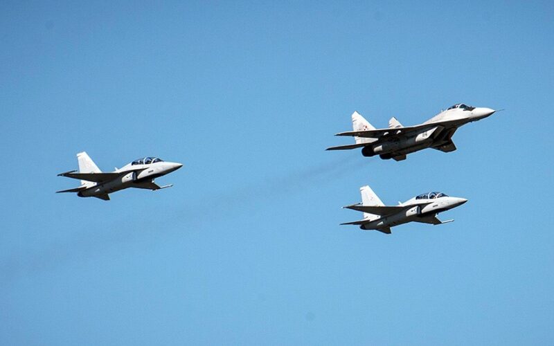 Two FA-50 flying in formation with a Polish MiG-29