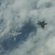 USAF F-35s fly with Finnish F-18s