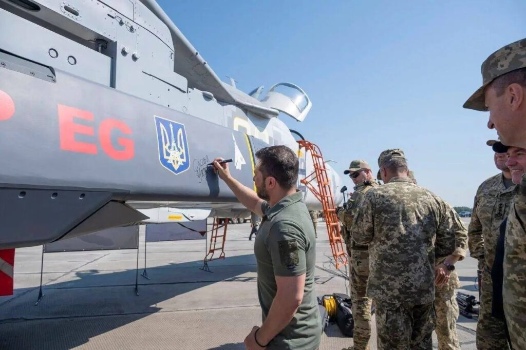 Ukrainian President Volodymyr Zelenskyy signs a SCALP missile