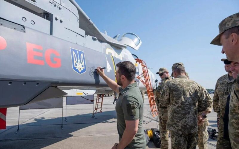 Ukrainian President Volodymyr Zelenskyy signs a SCALP missile