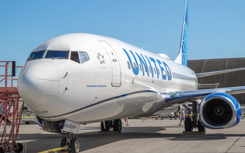 A United Airlines Boeing 737 900ER suffered significant damage to its fuselage following an American Airlines baggage cart hitting it at ORD