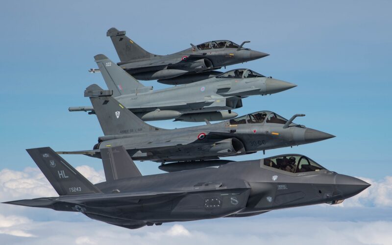 U.S. Air Force, French and Royal Air Force fighter aircraft participate in formation flight