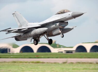 a_kf-16_fighter_jet_taking_off.jpg