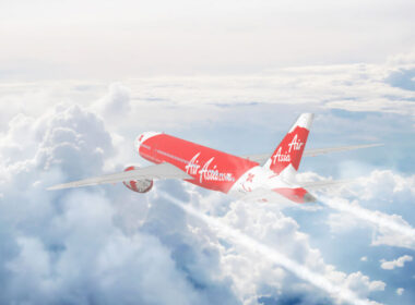 aerial_view_of_air_asia_cruising_above_fluffy_white_clouds.jpg